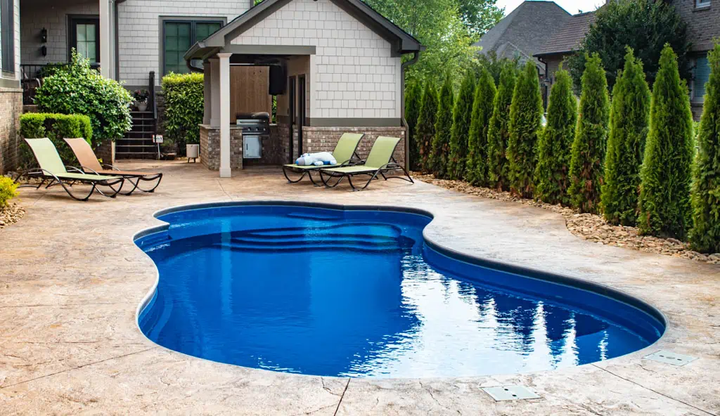 The Eclipse backyard swimming pool design by Leisure Pools